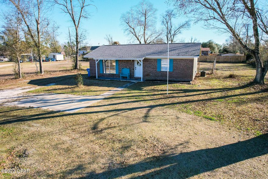 This adorable home has many upgrades. They have a new front and back door, new flooring throughout the house, septic tank was just pumped and serviced, A/C was serviced and cleaned this week and the house is ready! Updated appliances, fenced back yard and the house is just so cute! Great first home. There is a storage shed in the back yard and the beginning of a turn around drive in the front. This will be a great beginning for a new person, schedule your showing today!!