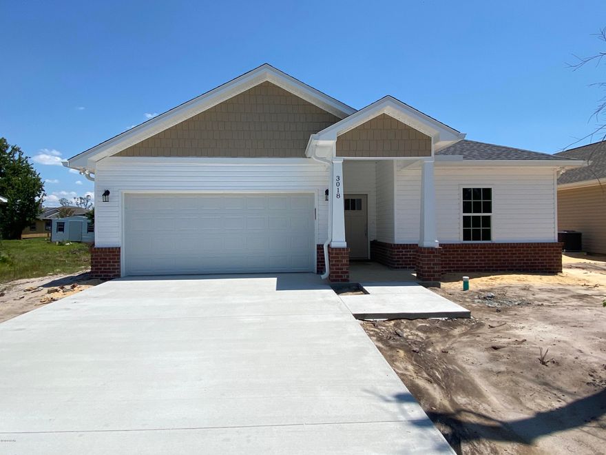 New construction centrally located in Panama City. Interior of home features an open design for the kitchen, living room, & dining area, LVP flooring, stainless steel appliances, & quartz countertops. Laundry room is just off of the kitchen and includes shelves for extra storage. Master bedroom features reading lights, raised electrical outlets for mounting a TV, & walk-in closet. Master bathroom has double vanity & large shower.