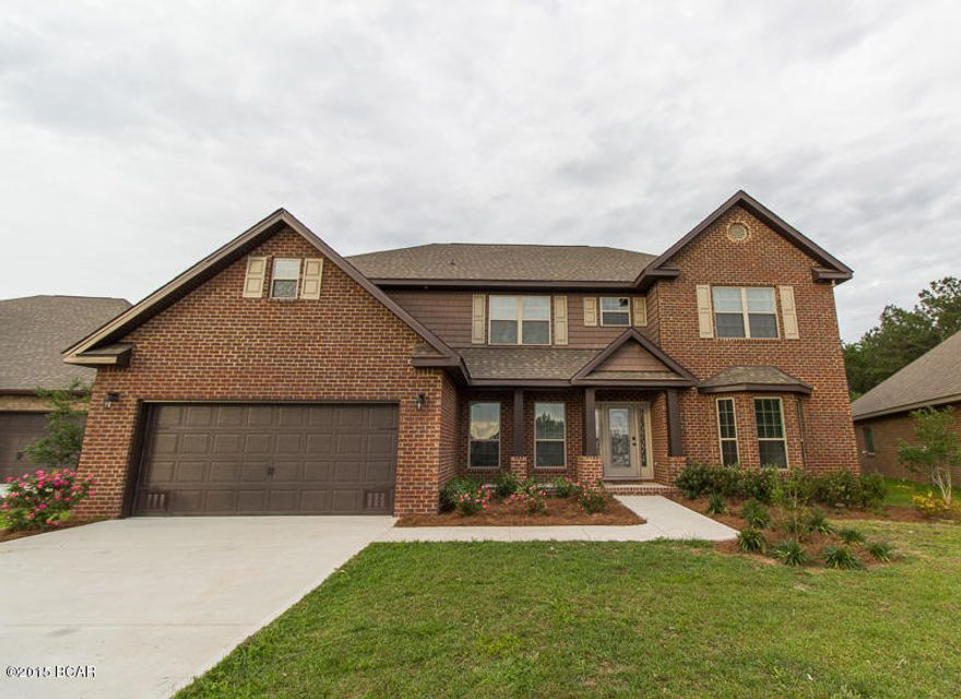 Amazing is the only word to describe this one! This 4,258 sq.ft. home has it all 6 Bedrooms, 3.5 Baths, Office, Formal dining room, and a 25x11 Bonus room. You'll absolutely love all the natural light in the living room from the floor to ceiling windows. The master suite located on first floor has double closets and a huge master bath with double vanities, garden tub, and a separate shower. The owners had several upgrades added to the home when they built it including beautiful wood flooring downstairs, granite countertops, and high-end cabinets. Just off of the living room is a wet bar and storage pantry. This is one of the biggest lots in Cherokee Heights and is 1 of 3 lots with land behind it that won't be built on.Great for extra privacy and more space for the kids to run wild. Located less than 1 mile to one of the area's best elementary schools also.