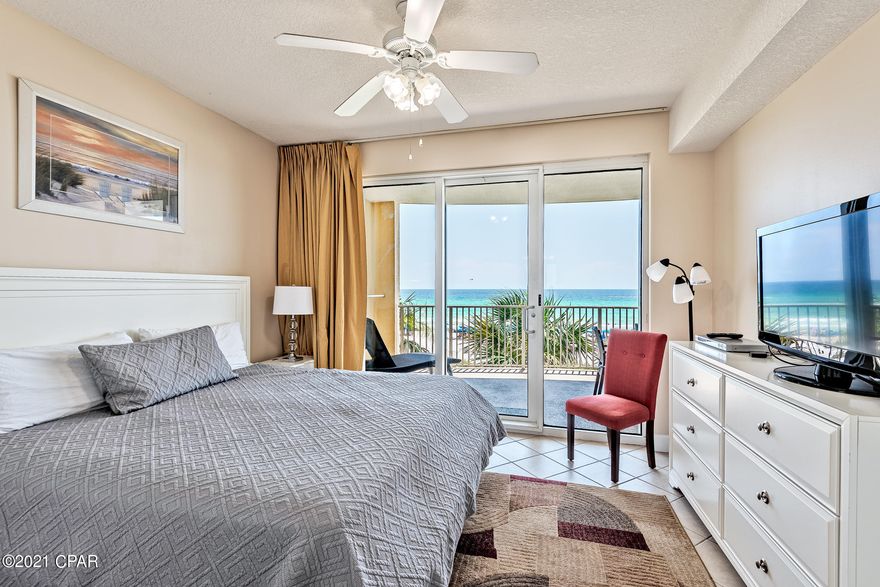 Third floor condo at Ocean Villa.  The building is known for being clean, well run, having a great floor plan, good parking, and a gigantic balcony for a 2-bedroom. The master bedroom opens directly onto the balcony overlooking the scenic Gulf of Mexico. This condo is tastefully decorated with tile throughout.  This unit has an outside owner's storage room. The complex has multiple levels of covered garage parking on both sides of Front Beach Road and a walkover for easy access. The third floor has a sauna, a small fitness area, and onsite Condo Association management. The ground floor has both outdoor (heated) and indoor pools, a sauna, as well as a hot tub and direct access to one of the beach. Measurements are approximate, verify if important.