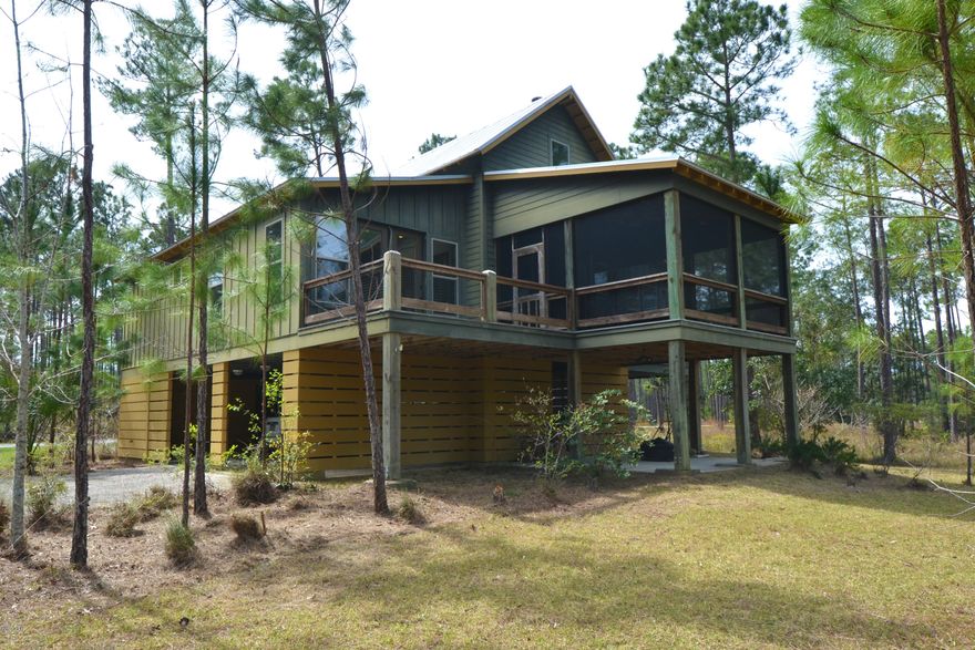 This beautiful 3/2 home is located on 1.8 acres, on a pond! Built by award winning, Bay County Builder of the Year, Koehnemann Construction. RiverCamps on Crooked Creek is a 1500 acre, gated oasis with 1000 acres committed to conservation. There will be no more than 450 homes when completely built out. RiverCamps is surrounded by West Bay, IntraCoastal Waterway and Crooked Creek. Bring your boat and enjoy a community boat ramp, day-use boat slips and dry storage. Amenities include a gym, library, catering kitchen, zero-entry pool, over 7 miles of trails, kayaks, canoes and paddleboards. All this and just 10 miles from the white sandy beaches of Panama City Beach!
