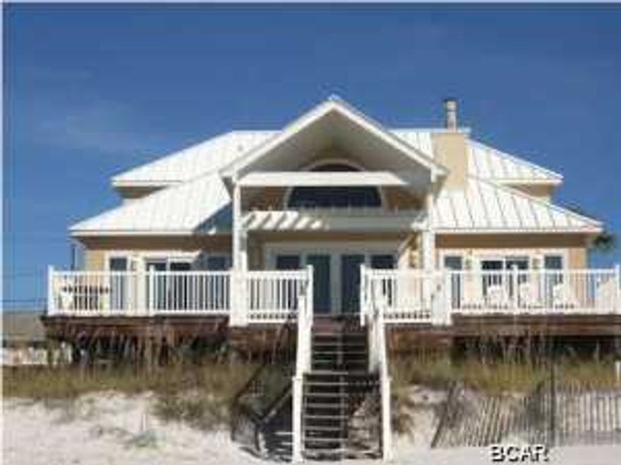 BEACHFRONT!!!!BEAUTIFUL oversize LOT 65' GULF FRONT on the West End of Panama City Beach! 1/2 mile from Carillon Beach. Magnificent Kitchen featuring 2 DW's, Double Ovens, Oversize Micro-wave!Built in separate Freezer and Refrigerator, Compactor. Massive Decks. Wonderful MBR and MBATH! Loft and each bedroom is separated with private bath! Travertine/Carpet Floors, Granite. 2 Master Bedrooms. 2 Laundry areas. GREAT RENTAL!!!