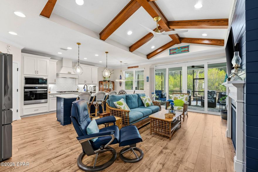 Motivated Sellers Alert: Luxury Cabana on Premium Preserve Lot in Latitude Margaritaville Watersound!

Why wait months for new construction or overpay for an inferior lot when this stunning Beach Collection Cabana is ready for a quick  move-in? 

Offering 2,394 sq ft of elevated coastal elegance in desirable Phase Five, this home sits on a premium preserve lot backing to lush, wildlife-rich green space--delivering unmatched serenity and privacy.

A sleek paver driveway welcomes you to the 408 sq ft 2-car garage, fully upgraded with whole-house water filtration, built-in shelving, durable polyurea flooring, and pull-down attic stairs for smart storage.

Inside, the expansive Great Room impresses with dramatic vaulted beamed ceilings, a striking tongue-and-groove accent wall, custom paint, and a cozy gas fireplace--perfect for gatherings and sunset toasts. The gourmet kitchen shines with quartz countertops, designer tile backsplash, 42'' crown-molded cabinetry, under-cabinet lighting with valance, and a custom island kick wall that creates a seamless flow.

Your private primary suite is a true retreat: tray ceiling, bay-windowed sitting area flooded with natural light, custom wainscoting accent wall, and a spa-like bath featuring tongue-and-groove details, designer fixtures, and bespoke vanity mirrors. 

Thoughtful custom organization throughout the closets, pantry, laundry, and garage makes everyday living effortless and clutter-free.

Outside, the extended screened lanai (complete with bird-caging for bug-free enjoyment) is paved in elegant stone and overlooks the peaceful preserve--your ideal spot for morning coffee, stargazing, or al fresco dining surrounded by nature's soundtrack.

Bonus: A 2023 Evolution HDK Ranger golf cart conveys with acceptable offer terms!

Prime location perks include just 5 minutes by golf cart to the new Watersound West Bay shopping and dining hub, under 10 miles to pristine Gulf beaches (via car or community shuttle), approximately 15 minutes to Northwest Florida Beaches International Airport, and quick access to top-tier healthcare.

This isn't just a home--it's your personalized gateway to the vibrant, Jimmy Buffett-inspired 55+ lifestyle at Latitude Margaritaville Watersound: multiple pools, Fins Up Fitness, on-site dining, live entertainment, pickleball, and endless island vibes.

Motivated sellers are eager to pass this dream along. Skip the build wait and start living the Latitude life today! This premium preserve-lot gem with high-end upgrades won't last long--schedule your private showing now.