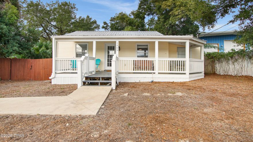 'CURRENTLY UNDER CONTRACT, SELLER WILL CONSIDER BACKUP OFFERS' Welcome to 1409 Hickory Avenue, a beautifully updated three-bedroom, two-bath cottage located in the desirable historic St. Andrews area of Panama City. This home features a thoughtfully renovated kitchen with new countertops, an updated bathroom, and recent foundation reinforcement completed by licensed professionals for added peace of mind. New Streets, Sidewalk, and Water lines coming soon.

The property offers a comfortable floor plan with inviting living spaces and classic cottage appeal. The backyard includes a couple of storage sheds, providing ample space for tools, hobbies, or outdoor equipment.

Situated in a quiet neighborhood yet conveniently close to popular restaurants, shopping, and the waterfront attractions of St. Andrews, this home combines charm, comfort, and location.

1409 Hickory Avenue is move-in ready and ideal for those seeking a well-maintained home in one of Panama City's most sought-after historic districts.