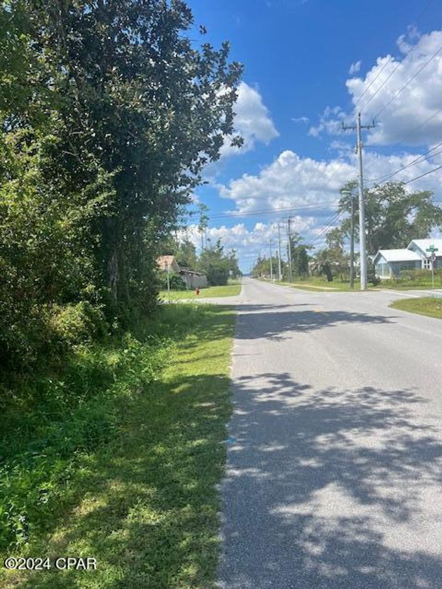 This lot is mostly cleared.  A few trees left for that shade!  Large corner lot that was divided to two separate building lots.   Sellers have a new survey for separate lots.

Awesome location and near the Bay, resturants, activities, and quaint neighborhood!