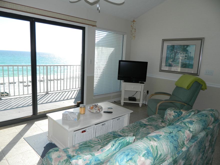 GULF FRONT 2 BEDROOM/2 BATH CONDO IN AN EXTREMLY POPULAR COMPLEX. SECOND BEDROOM IS A LOFT BEDROOM WITH IT'S OWN BATH.  THIS END UNIT HAS IT ALL: FANTASTIC VIEWS, IMMACULATE CONDITION, TILED FLOORS, GLASS TOP STOVE, WET BAR OPEN AND AIRY, LARGE BALCONY OVER LOOKING THE GULF FOR THOSE BEAUTIFUL SUNSETS OR SUNRISES. NAUTICAL WATCH A GREAT RENTAL COMPLEX. THIS UNIT WILL NOT LAST LONG, CALL YOUR REALTOR TODAY TO VIEW THIS BEAUTIFUL UNIT.