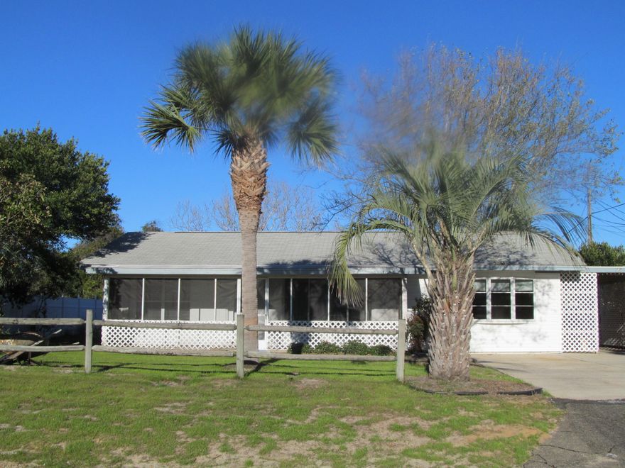 Walk to the beach from this 2 bedroom, 1.5 bath home. Home features open living area, covered porch, screened enclosed patio, Florida room and storage shed. $50 pet fee $250 pet deposit