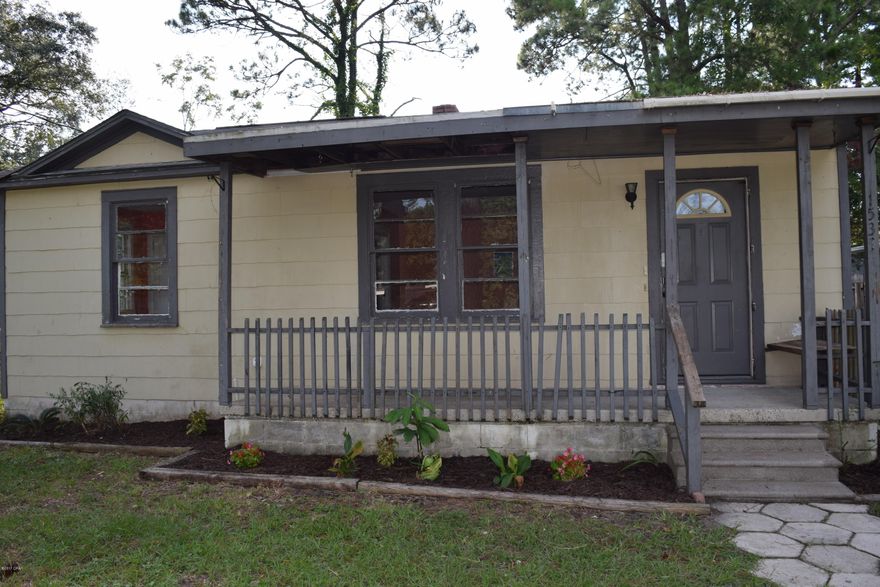Cute cottage with covered front porch,  large yard and yard buildings. The home has a spacious living room and a large master bedroom. This home does need a build out but offers an interesting opportunity.
