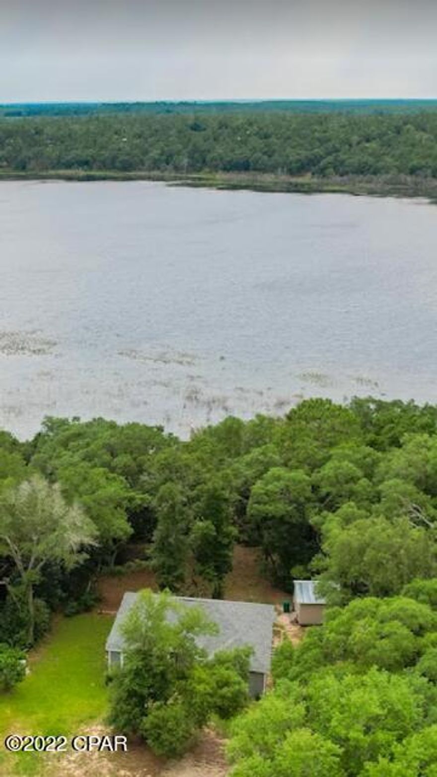 Life on the lake! What a beautiful sunset from your back deck! Fish, kayak, or swim, lots to do when you have a lake in your back yard! Also, the subdivision offers a boat ramp, swimming pool, tennis, basket ball court, as well as a pavilion and park!  The home has been maintained in a brand new manor so you could move right in, nothing to do! Three bedroom two full bath, open floor plan, HUGE master suite. Custom kitchen with view of  the lake, tons of room in the kitchen for an island.  9' ceilings,  pantry,  whole house has wood floors and crown molding though out. Cooper pipes were used for all water lines coming from well. Nice hills if you want to get a work out biking or walking!