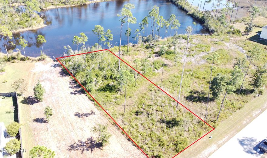 An amazing, lake front lot in the desirable Laird Point Community. Build two story to catch water views of fresh and salt water. The lake front lots are perfect for a peaceful view, fishing, and kayaking. Laird Point is a gated, waterfront community that features ribbon curbed streets and underground utilities. No preset time to build, so secure location now and build when the time is right. Amenities include gates, Rv/Boat storage, and new pickleball courts and basketball. Close to boat launches and full-service marinas. It feels extremely private, yet great proximity to restaurants and shopping.