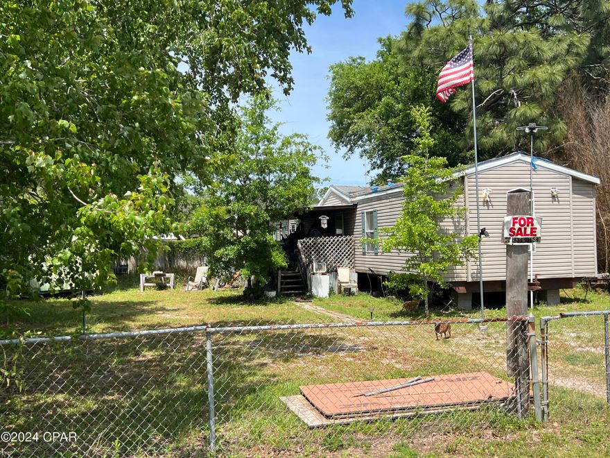 A PCB Fixer-Upper! Live on the PCB side of the Hathaway Bridge for under $200K!! This 1997 16' x 76' 1216 Sq Ft 3/2 is ready for your love and expertise.  Hurricane Michael has left its' scars.  Seller says the roof no longer leaks but interior repairs are necessary. If you are handy with the hammer, this is a rare sweat equity opportunity in the Panama City Beach area.  Be a part of the exciting re-growth in this Gulf Pines neighborhood. Reach out to your favorite Realtor and schedule a showing today!