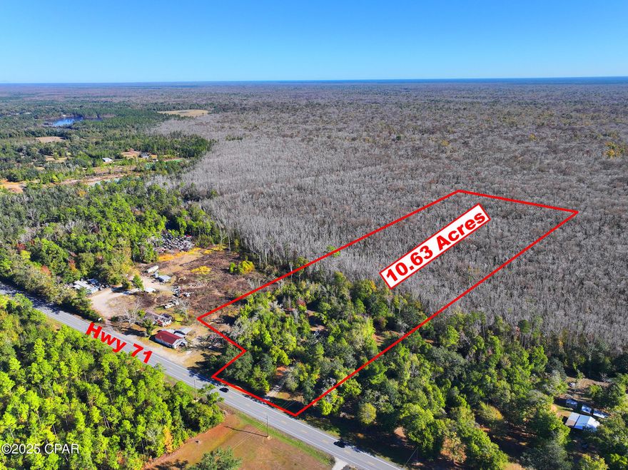 Discover 10.63 acres of opportunity in beautiful Gulf County, Florida, located at 3760 Hwy 71 S, Wewahitchka, FL 32465. This expansive property features native pine and shrubs, with a portion already cleared, offering the perfect balance of privacy and a blank canvas to bring your vision to life. Approximately 2.6 acres lie within X Flood Zone, ideal for building or immediate use, while the remaining acreage remains untouched, providing natural beauty and future potential. County zoning allows a wide range of uses including being RV Approved, making this an excellent option for full-time living, recreation, or investment. Enjoy the freedom of rural living while staying close to the Gulf Coast, fishing, boating, and nearby towns. With infrastructure already installed (freshwater well, septic system, utilities) this property is ready for immediate enjoyment. Don't miss this rare opportunity to own a versatile acreage in one of Florida's most desirable natural areas.