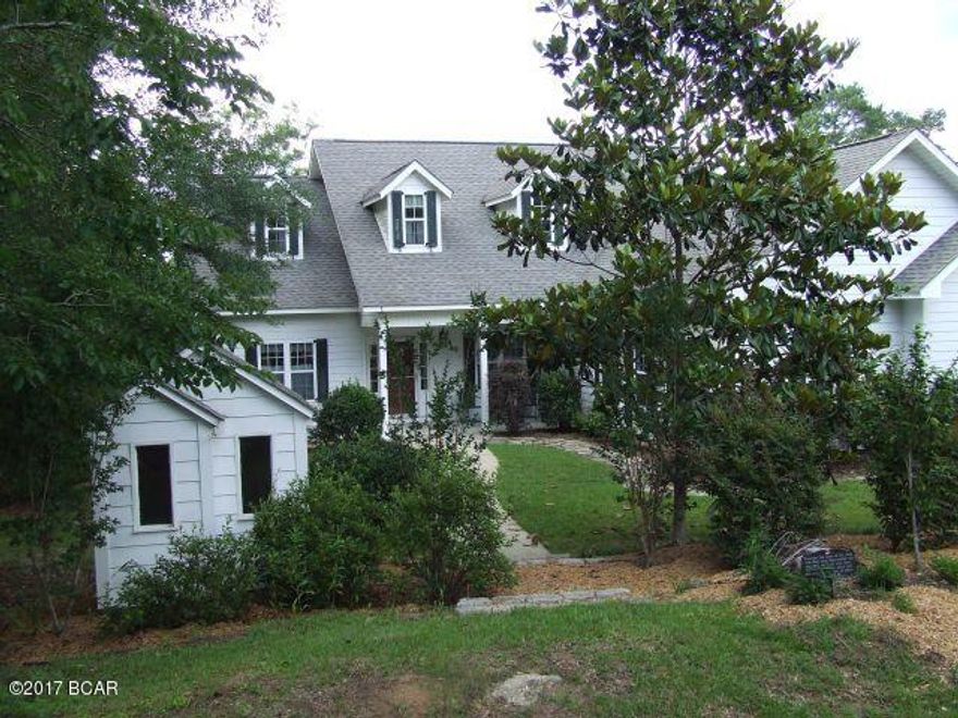 PRICE REDUCTION AND FURNISHINGS INCLUDED!!!   This is a DEAL!!!

Beautiful CUSTOM built spacious home on the Lake! Custom cut cypress flooring throughout the home. Large living room & stone fireplace, with a nice dining area. Spacious kitchen with island & plenty of cabinets & counter space. Master Suite - Bedroom, Full bath with Jacuzzi tub, walk-in closet. French Doors of bedroom open to indoor pool - a 7x14 heated ''Endless Pool'- has a continuous water flow to create a current for swimming - room also has a door that opens to sunroom/deck overlooking the lake,  large windows all around for the lake view. Additional bedroom, full bath, & laundry room which adjoins the huge garage/workshop. Upstairs a Mother in Law Suite with a full bath. All this with a Dock on lake to fish or relax!