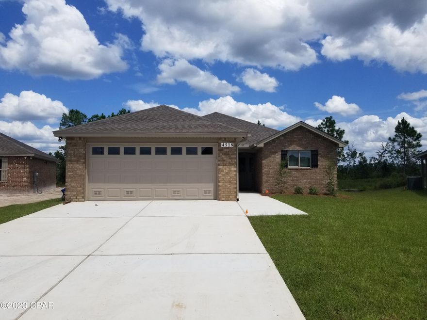 Open All Week for Tours & Over 7 Houses Available to See 10am - 3pm. Construction Almost Complete on this 3-bedroom 2-bath all brick new home with an oversize 2 car garage, with man cave, emergency generator hook-up. Open floor plan with outside covered patio and hot & cold outdoor shower. Master bedroom has a walk-in closet, box ceiling with recess lights with fan and the bathroom has walk-in shower with seat & double vanity. Nice size additional bedrooms & closets including all your blinds. The house has large open family room with electric fireplace, LVPs throughout house. The kitchen has real wood cabinets, Granite tops and SS applanates. Sprinkler system and security system included.  thermoseal spry foam system, dp150 windows with argon gas and the house is built to the new hurricane codes of Florida. If important information and measurements should be verified.