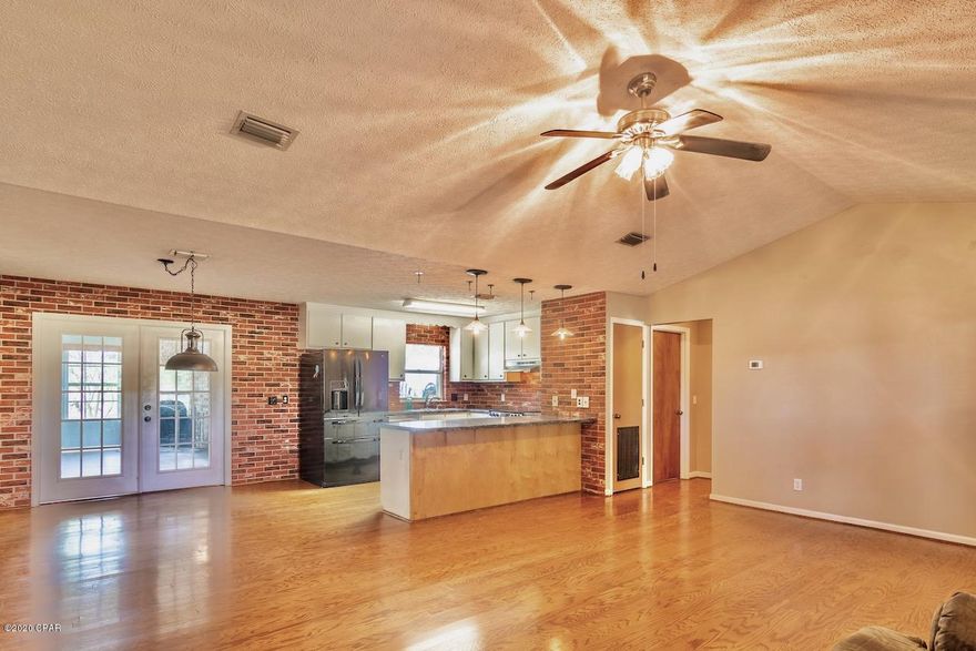 We have multiple offers. Please submit highest & best offer by 2 pm Sat. 5/30/20.   Horses? 6 acre corner lot!!! WITH a 42x35 4 stall stable that has a separate tack room, hay room, & lean to. Cows? Chickens? Pigs? Goats? Gardens? Did I say 6 acres?! Ponder the possibilities! This well maintained block constructed home w/stucco siding has a metal roof, wood burning fireplace, brick accent kitchen walls, open floor plan, large family room, split bedroom, full length front porch. Plenty of out buildings and an RV parking spot with it's own separate septic tank, water, & 30 amp power! Two 24x12 storage buildings, 1 with a water heater, washer & dryer hook up and a carport.  Would make a great guest house. The back sun room with fireplace adds more living space. There is also a 24x20 pole barn