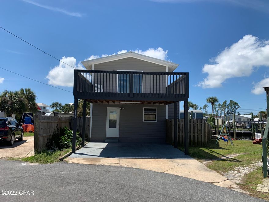 Waterfront with boat dock on PCB! 929 Marina Drive, a short boat ride to St Andrews Bay and off to the Gulf for fishing or Shell Island to relax. Why buy a waterfront house when you can rent one and enjoy all of the pleasures without all of the cost! Three bedrooms, two baths, two balconies, privacy fence, new roof, new HVAC, new seawall and dock, new paint. Tenant responsible for all utilities, pets negotiable, deposit is one month rent, Come visit today!
