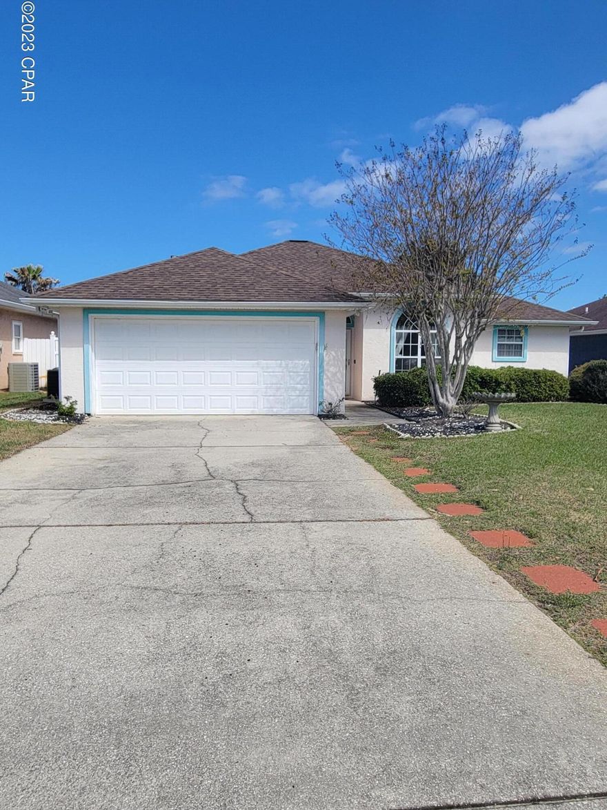 3 bedroom, 2 bath home with garage features split bedroom floor plan,open living/dining area, tile throughout home. Master suite features tub/shower combo, 										

double vanity and walk in closet. BONUS Sunroom off living room is heated and cooled and opens to large fenced back yard. Home located on a cul-de-sac with easy access to the beach. Alarm system is AS IS and activation is tenant responsibility. Separate meter for sprinkler system.