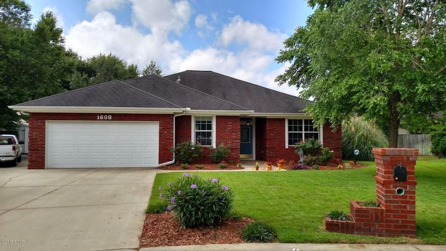 Beautifully maintained and updated home in the Mowat Highlands subdivision. This home has had some nice updates by the current owners. Living/Family room flooring replaced with ceramic tile, bathroom sinks, new vanities and accent tile added in both baths, all windows replaced with Low-E energy efficient windows, and a hot-tub installed (which stays for new owner!) The home has an open floor plan with 9 foot ceilings throughout, formal dining, living room with fireplace, breakfast bar and breakfast nook. The master suite is large and features a bath with garden tub, double vanities, separate shower and large walk-in closet. The backyard is the highlight of this home with large covered patio with hot tub, beautifully landscaped yard with firepit and water feature for soothing sounds