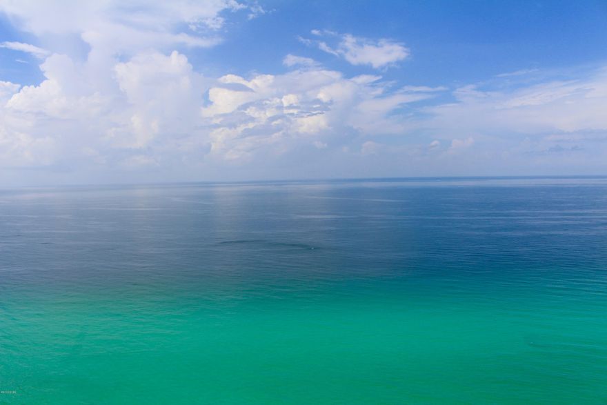 Tidewater Beach is so close to all the shops, restaurants and recreation in Panama City Beach.  If you like the high floors, here it is!  This 2 bedroom with additional bunk room and 3 bathrooms is ready for your second home or vacation rental.  This unit was on the rental for a short time, seller decided to enjoy it more so it became there second home.  This unit has a storage closet just steps away that has a separate deed that will convey with the purchase of this condo.  Not every condo owner has one and as convenient as this one. Travertine flooring in entry hall, bathrooms, kitchen and dining area.  Carpet in the bedrooms and living area.  Kitchen has granite countertops, stainless steel appliances and sink.  Tidewater Beach has many amenities, covered parking garage and walkover to to the building on the beach.  There are 2 outdoor gulf front pools, 1 indoor heated pool, restaurant, 2 game rooms, a convenience store is available, large beach front fitness center, movie theater, enjoy 4 hot tubs, steam rooms, sauna, conference room, computer lounge, library/game area, beach chair service and an owner's lounge on the 30th floor.