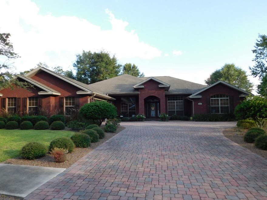 THIS IS A MUST SEE! Beautiful custom home featuring coffered ceilings in the living room, exquisite woodwork through out the home over doorways and crown molding throughout most of the home! Hardwood floors throughout living area, tile in wet and newly carpeted in bedrooms. Two of the additional bedrooms share a Jack and Jill bath and both have their own oversize vanity and walk-in closet area and share the commode and tub/shower combo.  The 3rd bedroom on the back is adjacent to the 3rd full bath which is close to the screened porch with pool right outside. Also, featuring a wonderful Master Suite with Trey ceiling and huge master bath with double granite vanities, walk-in closet, whirlpool tub and separate tiled shower! All this and so much more in this Fabulous home! All measurements and information should be verified if important.