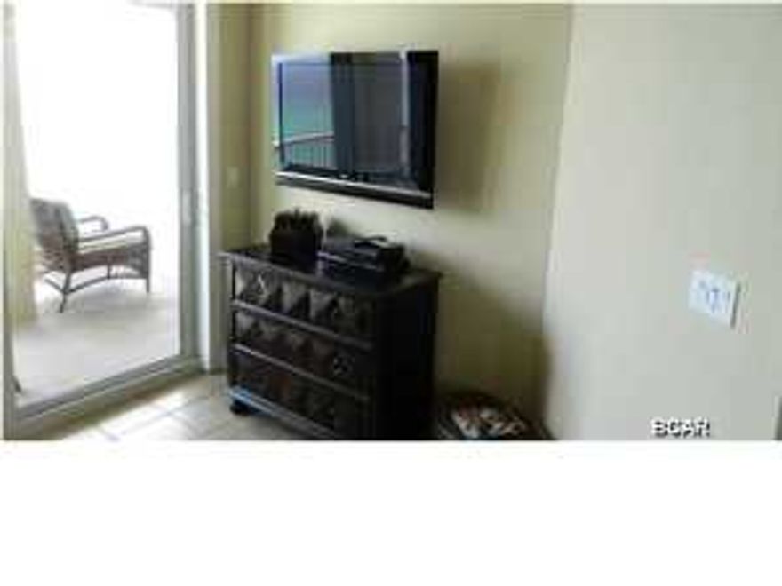 Beautiful desired Grand Panama Beach Resort, 3 bedroom 2 bath beach front Condo comes completely furnished. Just recently tiled entire unit. Well appointed with stainless appliances and 3cm granite. Under counter lighting, tile backsplash. Large window at dining area looking east down beach. Grand Panama is fast becoming one of the most desired resorts on PCB. Take a visit and you'll see why. Great amenities. Close to all new shopping and entertainment.