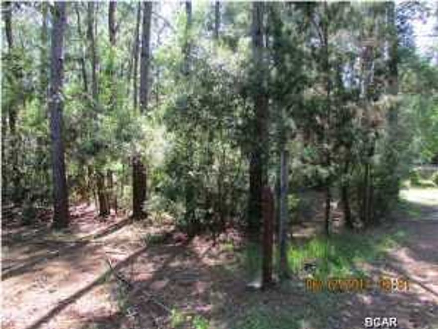 1 acre beautiful lot with a pond making it a prefect place for your home. The properly had a mobile home but is was removed the condition of the well and septic are unknown therefore lot is being sold in ''As Is'' condition. Current survey is available. All ages, sizes including sq. ft. are approximate measure if important.