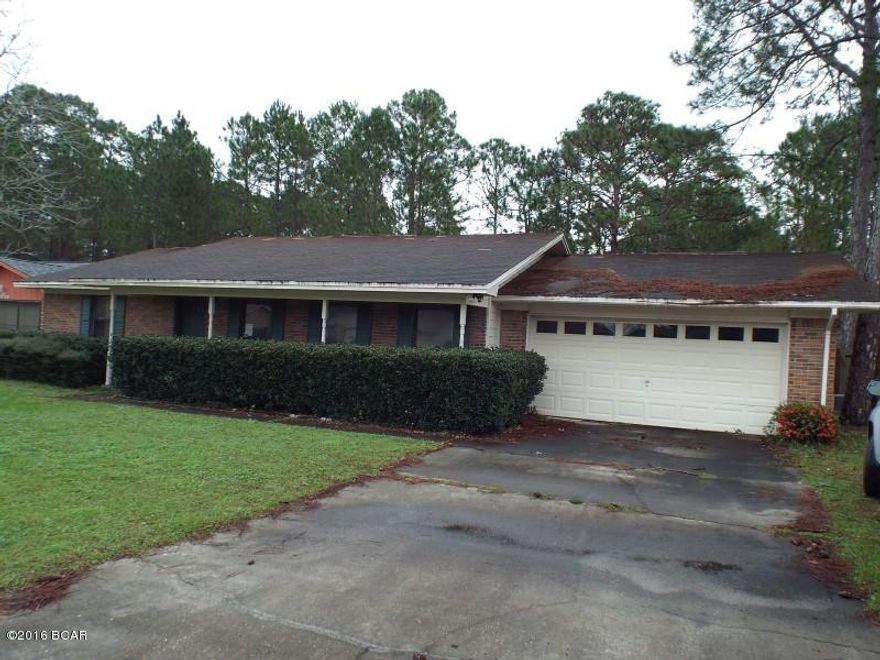 REDUCED!!!  Brick three bedroom two bathroom house with 2 car garage, Florida room, and privacy fence offered as is. All sizes are approximate or taken from other sources Please verify accordingly.