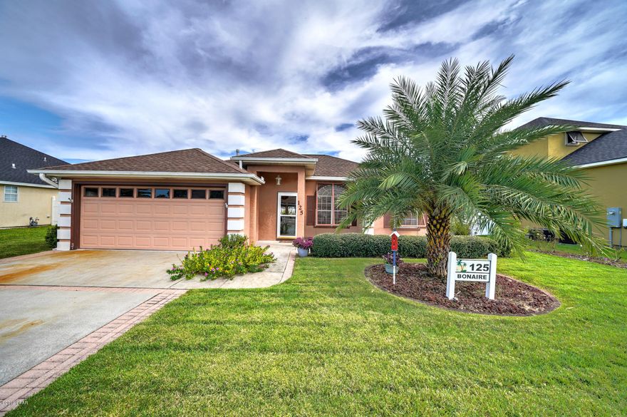 Must see!  This beautiful home in one of the best family neighborhoods on the west end, Summer Breeze!  Low HOA fees and no short term rentals.  This home is move in ready!  Blocks from the beach, with your own private saltwater pool and amazing garden!  Year round flowers.  2 car garage with tons of storage!  Beautiful granite counter tops in the kitchen and baths, huge custom tiled shower in the master bath.  Tile floors in the kitchen and hardwood floors through out the rest of this immaculate home!