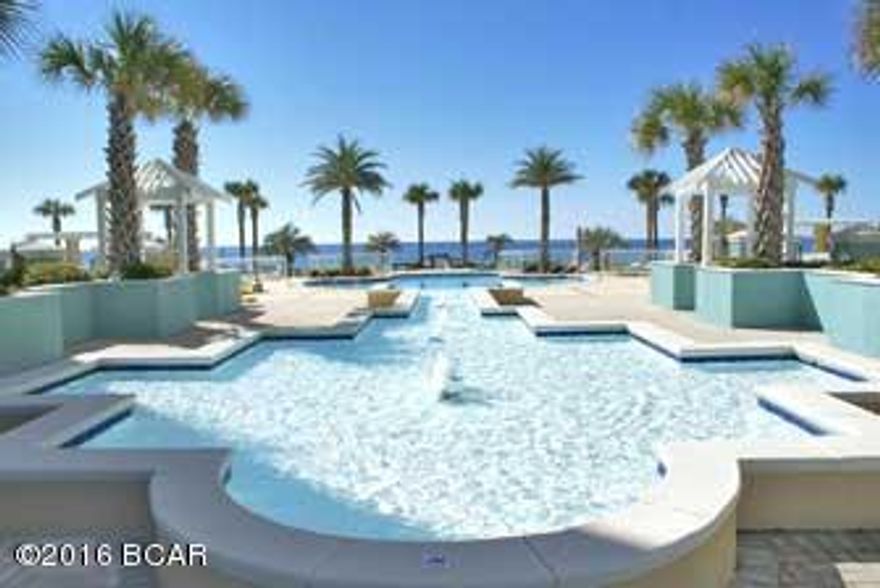 When you step into this luxurious condominium residence you'll know that you're now at home... This absolutely stunning end unit with four bedrooms, three full bathrooms - the 4th bedroom can be used as a bunk room for the kids or an office - is all you could ask for and more! This elegantly furnished unit offers extensive crown molding, granite counter tops and is move in ready. The Spacious open kitchen is adjacent to the dining and living area with a gas fireplace and access to the balcony. Plenty of space to entertain while watching the sunsets from one of the largest balconies on the beach with a summer kitchen featuring a built in grill. Underground parking space and storage locker is also included. En Soleil is the premier luxury property not just in Panama City Beach, but is among the finest communities along the gulf coast. En Soleil enjoys 450 foot of beach front and with only 3 units per floor, En Soleil offers privacy to all owners. Amenities include 6,500 square feet of gulf front pools, two hot tubs, two grand waterfalls, two water fall fountains, gulf front fitness center, underground private parking, additional outdoor parking, 24-hour security and gated entry.