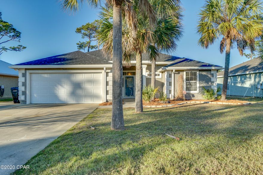 Looking for one of the best buys on Panama City Beach? Look no further than this great 3 bedroom, 2 bath home with over 1500 heated and cooled sqft, located in the popular Hidden Pines Subdivision close to the Navy Base, Patronis Elementary, and St Andrews State Park. The exterior offers an extended driveway for plenty of parking or space for your boat and just the right amount of back yard to entertain or install a pool with a large screened in patio. The interior offers a large living space and a split bedroom floor plan.  Vinyl plank flooring and tile throughout. New Roof after storm. New exterior paint and sealant as well as new seamless gutters. Call your Realtor TODAY to see this great property.