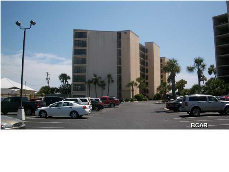 Very nicely done 2-Bedroom, 2-Bath Gulf Front unit at Moondrifter Condo. Updates include lots of kitchen cabinets, corian counters, sinks, hardware, raised vanity and hardware and lights in the larger bath along with some new furniture pieces, and tiled balcony.  This is a spacious unit overlooking the pool with a beautiful Gulf and beach view and is ''SUITCASE RENTAL READY).  Moondrifter is a small lowrise complex so you don't have big crowds to deal with or long waits for the elevators..  A nice BBQ area along with a gulf side pool and deck area, and also a tennis court are some of the amenities.  Moondrifter is located on the West end of Thomas Dr. which makes it convenient to town and the rest of the beach.  Onsite rental and HOA offices make it convenient for owners and guests.