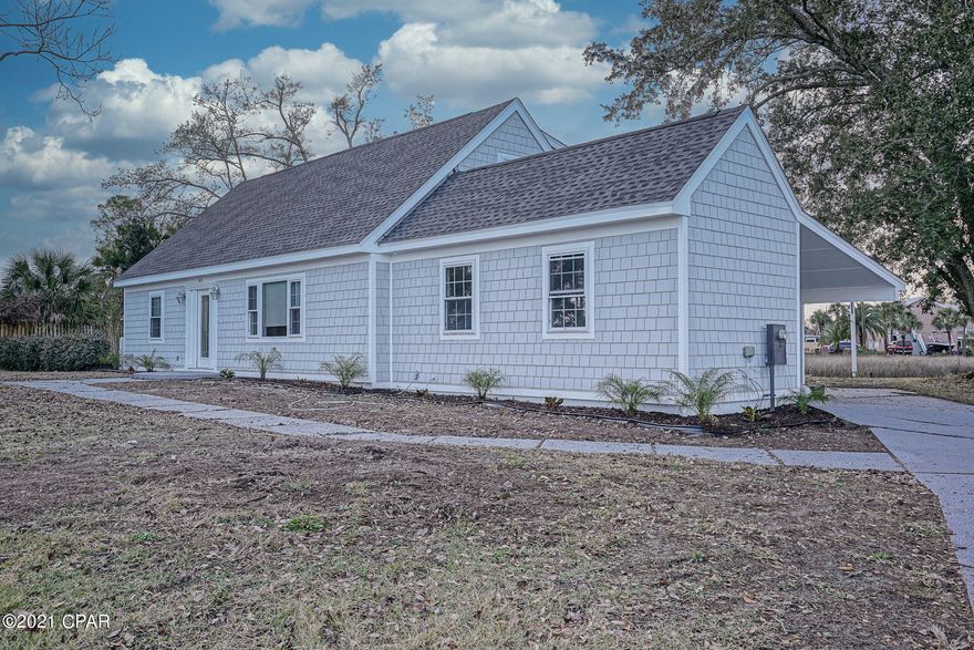 BRAND NEW renovated 4/3 in Lynn Haven!! Conveniently located close to US-390 & US-77. Modern, open layout. New roof, new kitchen countertops, new stainless steel appliances, new cabinets, new interior & exterior doors, NEW NEW NEW, the list goes on and on!! High impact windows. Freshly painted inside, light gray laminated vinyl wooden floors throughout the entire house (No Carpets). Walk-in Closets. Master bath with shower, and tub in 2nd & 3rd bathroom. SWEEPING back porch overlooking the water. GIGANTIC lot. Shed in backyard. Two boat docks. No HOA. 



In essence, your dream home awaits :)



SELLER FINANCING AVAILABLE



CALL FOR DETAILS