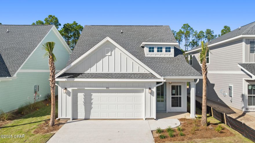 Welcome to 881 Walsonham Drive, a new home at Breakfast Point East, located in desirable Panama City Beach. This thoughtfully designed two-story home combines modern convenience with timeless charm, making it an ideal primary residence or tranquil second home getaway. Boasting over 2,000 square feet, the Islamorada offers four-bedrooms, three and a half bathrooms, and a 2-car garage.

As you enter this home through the covered entry, you will find a bright foyer and a stairway finished with wood treads leading to the second floor. Continuing down the hall, you will pass the powder room conveniently located near the living area for guests. The entry hall opens to the open concept living area where the kitchen, dining area, and family room merge seamlessly with EVP flooring throughout. The large center island is situated in the center in which you'll find an undermount sink and a dishwasher. Modern features adorn the kitchen including quartz countertops, stainless-steel appliances and gas cooktop, soft-close Shaker-style cabinetry, and a full pantry with built-in wood shelving.

The primary bedroom is located on the main level of the home just off the family room. It offers a private retreat at the end of the day and features 9-foot ceilings and EVP flooring. Elegant features dress the ensuite bathroom including an oversized shower enclosed by glass doors, a double vanity, and generous closet with built-in wood shelving. The additional bedrooms are located on the second level as well as an additional sitting area. Schedule your tour of this home today.