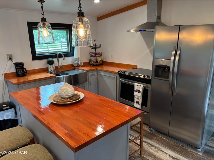 Currently under contract, seller will consider back up offers. ***INVESTORS, PLEASE READ REMARKS IN THEIR ENTIRETY!!! SELLERS WILL FINANCE WITH 40% DOWN AT A 6% INTEREST RATE, 30 YEAR AMORTIZATION, WITH A 2 YEAR BALLOON!!! COMPLETELY RENOVATED 4 BEDROOM, 3 BATHROOM MOBILE HOME WITH TOP OF THE LINE UPGRADES AND UPDATES!!!*** This incredible property sits on 10 acres of completely fenced in land that could possibly be subdivided for future additional development. Live in the current home, rent it out, or build your dream home on this incredible property that has so much to offer. Seller's have spared no expense in COMPLETELY renovating this incredible home. A private electronic gate welcomes you to to this open concept design home. The main home consists of 3 bedrooms and 2 bathrooms, while the separate apartment has 1 room, kitchen area, and full bathroom. Upgrades and updates are as follows but not limited to: All new sheetrock walls, ceilings, baseboards, trim and paint, vinyl plank flooring, doors and barn doors. Brand new kitchen with 3 year old appliances(washer and dryer are negotiable), wood island and wood countertops. All new LED light fixtures throughout the home, and both main home bathrooms are completely renovated with all new showers, toilets, sinks, cabinets, LED lights, exhaust fan with bluetooth, and smart mirrors. The back porch is completely screened in and is the perfect spot to relax and enjoy the peace and quiet of this incredible property. The 12x12 shed has been converted into a separate apartment, complete with electricity, window A/C, full bath with shower, eating area, and washer and dryer area. There is also a 40 foot shipping container with a roof that is currently being used as a storage area and workshop. The sellers built an adorable treehouse...to be used by children of all ages :-} The private well comes with a water filtration system, and to top it all off you have a stocked pond and plenty of clear riding trails. Hurry up and call me before this little slice of heaven gets away!! All information is approximate and should be verified by buyers if important