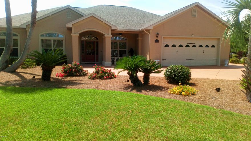 Currenty UNDER CONTRACT - BACK UP OFFERS BEING ACCEPTED.  717 Sandbar Drive in bay front/canal community of Dolphin Bay is a home that is every Buyer's dream.  Custom built  on choice lot in 2004.  Every detail to quality construction was incorporated. 10' 

foot ceilings with transoms over all windows and doors.   Open kitchen, great room & breakfast nook is the heart of the house.   Formal dining and living rooms provide space for entertaining or convert to office?  Master bedroom has double french doors that open out onto pool deck. Master bath with large door less tiled shower and jetted garden tub is accented with lots of natural light.  Builder included 2 car garage. Large storage room plus extra driveway parking for guest has been added. Interior and exterior of house and driveway recently painted.
New light fixtures and ceiling fans in and outside the house.  New wood floor in family room. New pool enclosure and window screens.
Refinished gunite pool.  Plantation shutters and cellular shades for all 
windows and doors remain.  Garage is every man's dream.  Too much to describe.  Call today for appointment to see the home you do NOT want to miss. Truly move in ready. No interior hurricane dame.  Roof & screened pool enclosure replaced after the storm.  Quick closing and move in encouraged. All measures are felt to be true.  Please measure to verify.