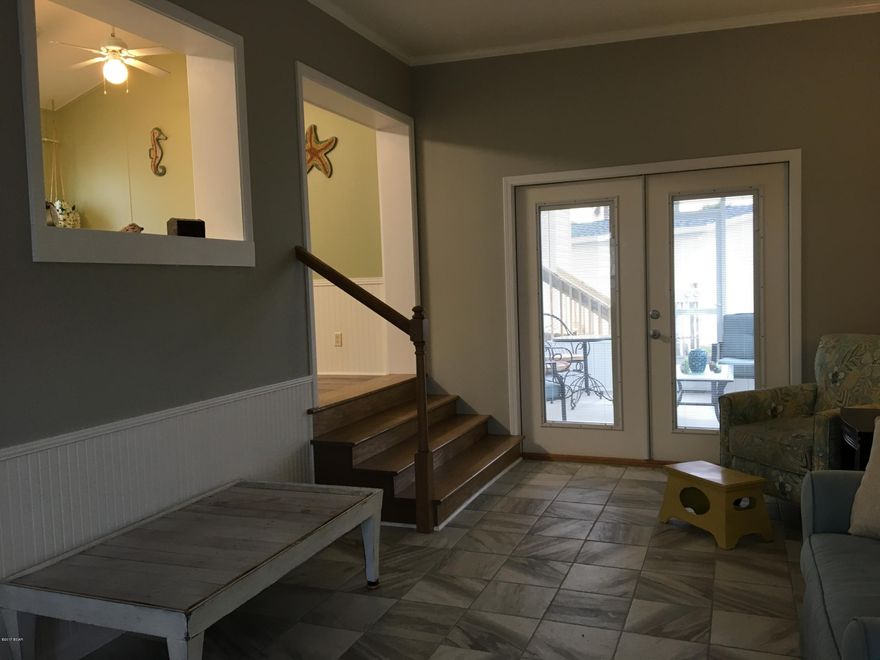 Spacious - Roomy - Beautiful only begin to describe this home.  Two new additions make up the living room and master bedroom.  New roof.  Brand new screened porch and new carport.  Large eat-in kitchen with new cabinetry, new stove & frig. Gorgeous porcelain tile in living room.  Large closet in master; dressing area off the master. Very nicely decorated with coastal chic touches and colors.  2 community pools, playground, exercise room and community room.  Many planned activities for the residents.  HOA maintains all yards and landscaping.  Gated community.  Come enjoy the relaxed, friendly life at Emerald Pointe Resort.  You'll love it!!