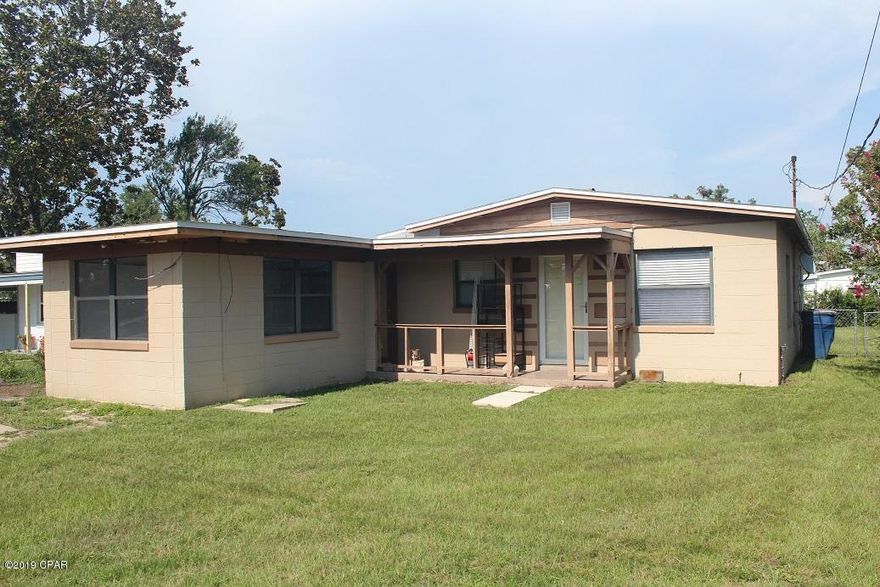 Sturdy block home in Oakland Terrace area.  Home is just around the corner from Oakland Terrace Park which features baseball fields, walking area, play grounds, tennis courts and basketball courts.  This sturdy block home received minimal damage from the hurricane, but did get a new roof and is in need of some sheetrock in the dining area and Den.  The home features a Living room and a Den for extra living space.  The Den could be converted into a fourth bedroom or would be a great hobby room, exercise room or office.  The home is in need of new flooring and ceiling in Den along with some  updating, but would be a great home to live in or rental investment.  There is a nice clean backyard that would be perfect for entertaining.  Home comes with a one year home warranty.