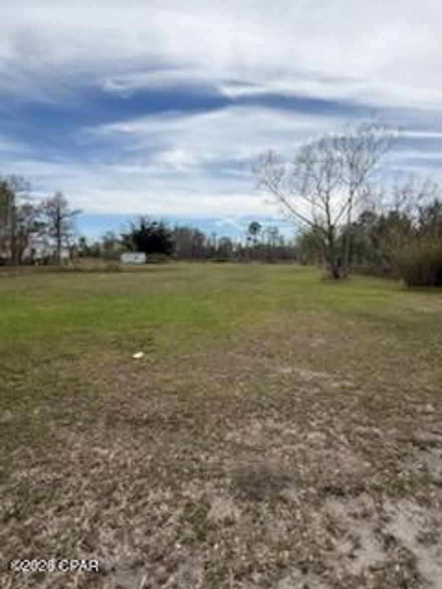 Escape to your own piece of paradise with this stunning 1+ acre homesite. Featuring mature, fruit-bearing trees and a serene private pond, this property is the perfect backdrop for your dream home. Enjoy rural tranquility with easy access to modern conveniences. Well and septic on site not sure if working. Sold As-Is.
Panama Pines is a residential subdivision located in Youngstown, FL, within unincorporated Bay County, NO HOA