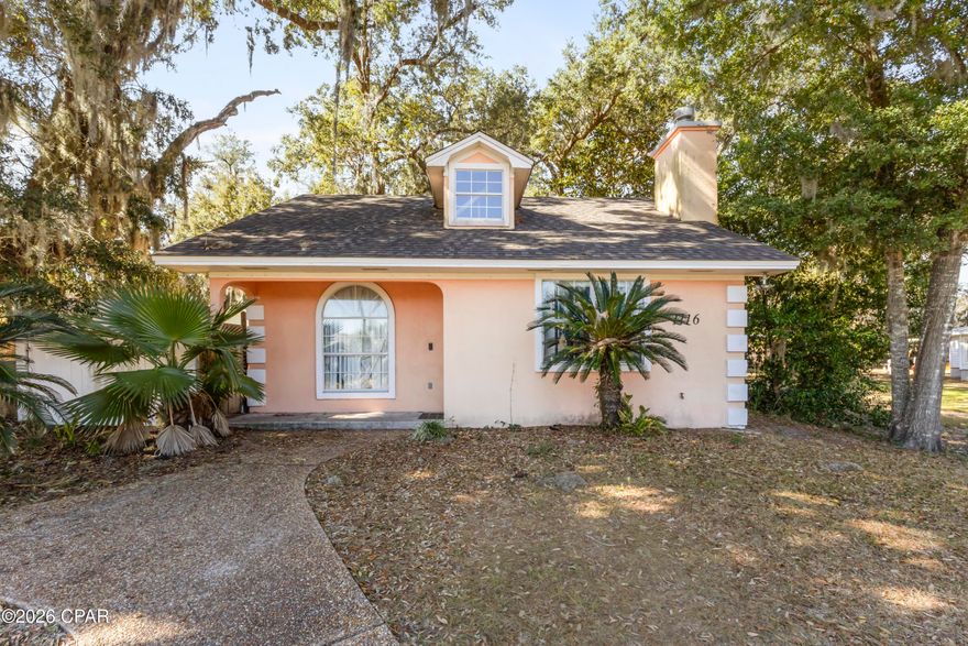 Charming cottage style home with water views!
Home does need some work & is being sold As-Is.
So much potential in this cozy home with space for entertaining, grilling in the back yard, gardening & more!