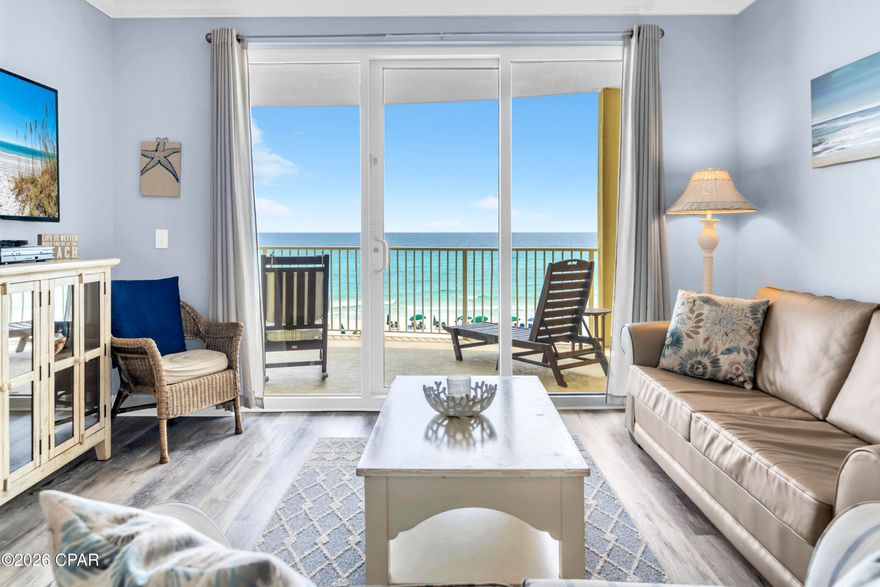 Bright, spacious, and ideally positioned on the 4th floor, this residence at Emerald Isle offers an exceptional blend of comfort, style, and investment potential. Designed for both personal enjoyment and strong rental performance, the layout comfortably accommodates up to six guests while maintaining an open, airy feel throughout. Nine-foot ceilings, crown molding, and expansive sliding glass doors flood the living space with natural light while framing stunning Gulf views. The property conveys fully furnished with high-end furniture and accessories, making it truly move-in or rental ready. Luxury vinyl plank flooring runs throughout, delivering a clean, modern look with durability suited for beachside living. Meticulously maintained, the unit also features numerous updates, including custom walk-in showers in both the primary and guest bathrooms, new LVP flooring (2025), washer and dryer (2024), HVAC system (2021), and water heater (2019)--providing added peace of mind. The kitchen, dining, and living areas flow seamlessly together, creating an inviting space for gathering while maximizing the view. The kitchen is well-appointed with granite countertops, ample cabinetry, and a convenient breakfast bar. A true highlight of the property is the oversized Gulf-front balcony--approximately 10' x 28'--featuring a distinctive curved design that captures sweeping, panoramic views of the emerald waters and sugar-white sandy beach. Accessible from both the living area and the Gulf-front primary suite, it's the perfect place to start your day or unwind at sunset - providing the ultimate alfresco living and entertaining environment. The Gulf-front master suite offers direct balcony access and stunning water views, while each bedroom includes its own private bathroom, ensuring comfort and privacy for owners and guests alike. The unit also includes an exterior storage closet. Emerald Isle offers resort-style amenities, including two pools (one indoor and one outdoor), a whirlpool, Gulf-view fitness center, sauna and steam room, BBQ grills, and a poolside pavilion. HOA dues cover most utilities, making ownership simple and efficient, and owners are welcome to bring pets. Located on the quieter west end of Panama City Beach, directly on the area's renowned sugar-white sand beaches, this property offers the perfect balance of relaxation and convenience. You're just minutes from Pier Park, dining, shopping, entertainment, and Northwest Florida Beaches International Airport. Whether you're searching for a second home, full-time residence, or a proven rental opportunity, this Emerald Isle condo delivers Gulf-front living at its finest. All measurements are approximate; buyer to verify if important.