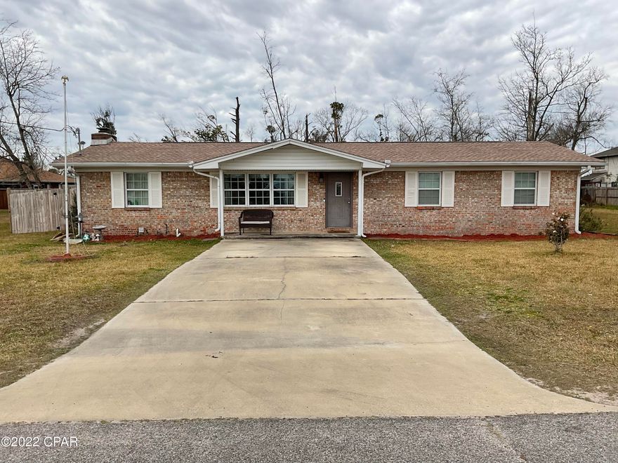 CURRENTLY UNDER CONTRACT, SELLER ACCEPTING BACKUP OFFERS. This home had a complete and extensive renovation in 2016. Nice open floor plan with upgraded kitchen with modern wood cabinetry, stainless appliances, large island and granite counter tops.   Both baths completely redone at that time, and master suite has walk in tile shower.  Family room has a real wood burning fire place with beautiful natural stone cladding surround and oversized sliding glass doors leading to the back yard. Very large driveway for plenty of parking.  Almost half acre lot (yes it includes the area that looks like an extra lot on the north side of the home).   Lot also goes deeper than the fenced in area.  Cedar Grove Elementary right across the street. Only 150 feet from the Sheriff substation.