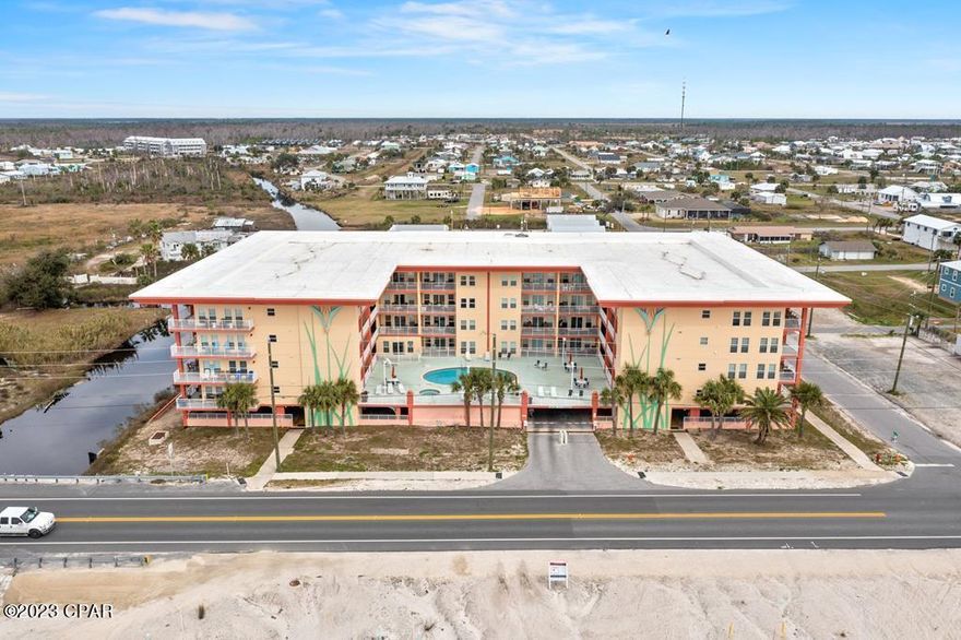 GORGEOUS 3BD/3BA GULF VIEW CONDO located in Paradise Shores. UNIT 411 is a beautifully decorated corner end unit that faces the Gulf & Hwy 98. Located on the 4th floor this fabulous condo boasts a pool with gorgeous gulf views, hot tub, exercise room & PRIVATE DEEDED BEACH ACCESS. Paradise shores has 2 covered parking decks and easy access to elevators. It is the best located condo in town. This unit fronts the beach/Hwy 98 and affords absolutely the best Gulf Views in Mexico Beach. It also has GORGEOUS SUNSET VIEWS over the water. This unit is beautifully decorated with high-end furniture and has an open concept floor plan. Selling Fully Furnished!! GREAT RENTAL INCOME, GREAT INVESTMENT.