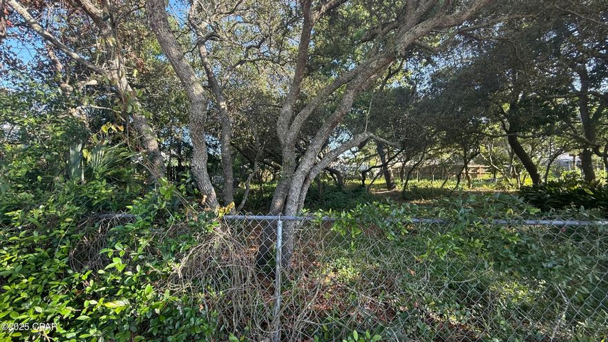 Located just 2 ½ blocks from the stunning Gulf of Mexico, this lot in the desirable Open Sands subdivision offers the perfect opportunity to build your dream beach retreat. With no HOA and a laid-back coastal vibe, this prime Panama City Beach location is ideal for full-time living, a second home, or a vacation rental. Enjoy being close to local favorites like Runaway Island, AutentiKa Mexican Grille, The Local Steamer, and a variety of shops, ice cream spots, and beachside entertainment. Embrace the best of beach living with quick access to the sand, dining, and everything that makes the west end of PCB so sought after.