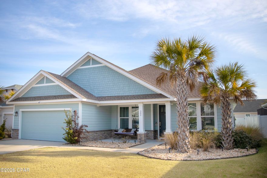 Welcome to Breakfast Point in Panama City Beach, a family-friendly community.  Development is known for its central location, craftsman style homes, sidewalks, street lights, underground utilities and walking distance to the top rated, Breakfast Point Academy.  Property is conveniently located to the Beach, Pier Park, shopping, restaurants, The Naval Station, easy commute to Tyndall Air Force Base, etc.  This home features 4 bedrooms (split floor plan), 3 baths, kitchen with large island (breakfast bar), all stainless ''Bosch'' appliances which includes a five burner gas range, dining room, living room (open concept), laundry, 2 car attached garage and a covered patio.  In addition the property has a large fenced yard situated on an association easement providing additional privacy.  Don't let this one get away!  Original owners are relocating within same subdivision due to growing family.