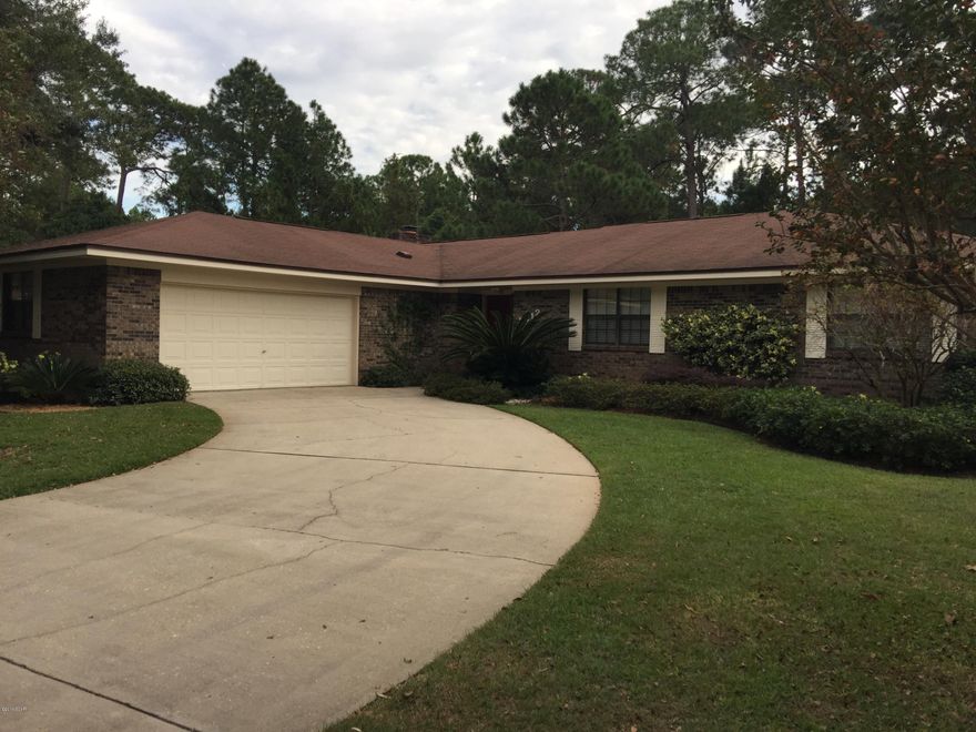 KINGS POINT HARBOUR ... much sought after neighborhood, with some of the finest homes in Panama City, FL. Location, location, location! All brick home situated on large lot,4 BR/2Bath.This home shows true pride of ownership from the Beautiful landscaped yard,(No neighbors in back) to the inviting interior. Spacious living room includes a wood-burning fireplace. Over-sized garage with storage room.