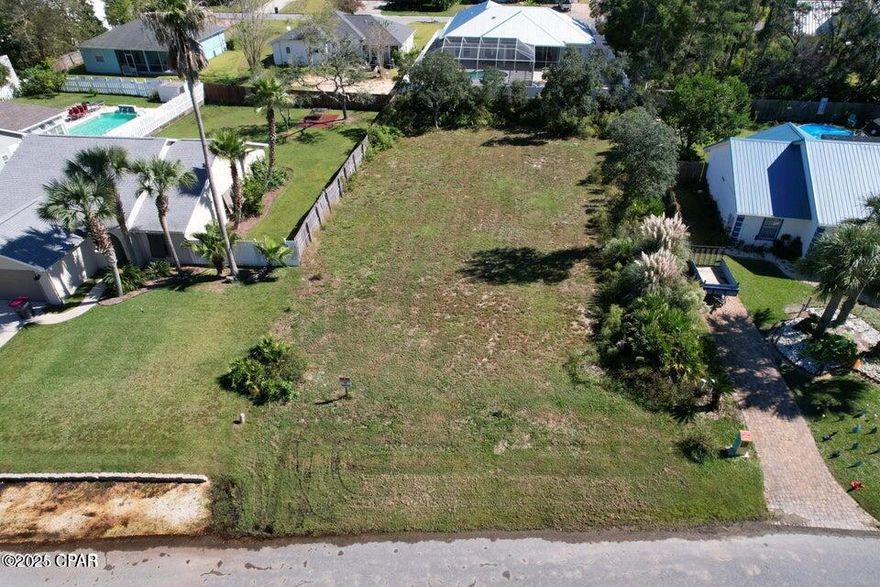 A prime and mostly ready to build lot in West Panama City Beach, South of 98! Lot is 75-foot-wide and 132 foot deep. No HOA and is steps from the world's most stunning beaches. Quick access to Pier Park, the airport, 30A, and all the best of Panama City Beach!