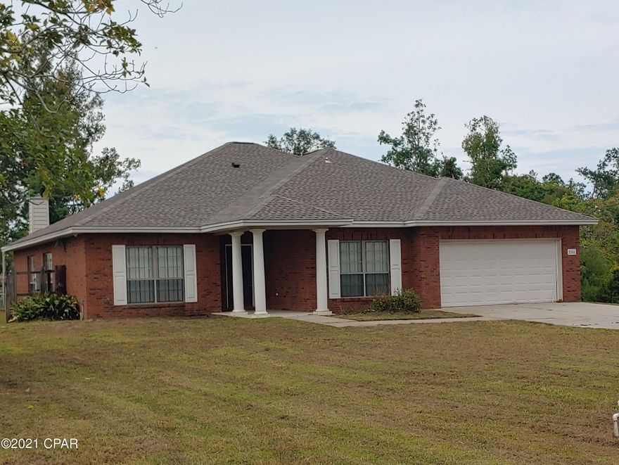 CURRENTLY UNDER CONTRACT, SELLER ACCEPTING BACKUP OFFERS Beautiful spacious home on large lot in great location with easy access to 23rd St and Hwy 390. Kitchen features granite countertops and breakfast bar and is open to living space. Large living room with fireplace and access to rear screened patio. 

This home feels huge with large open living room, dining room, laundry room, and bonus room. Plenty of closet storage throughout. 

Master suite features walk-in closet, jetted tub, shower, dual vanity, and private access to screened patio.

New septic system, 2019 Roof.

All sizes and dimensions approximate, buyer to verify. Driveway is shared.