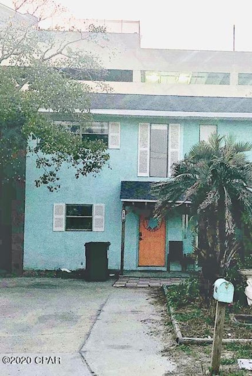 Steps to the Gulf! This 2 bedroom, 1.5 bath townhome has NO HOA, NO new buyer fees and is steps to the beach. Downstairs features a remodeled kitchen, full sized laundry area, remodeled 1/2 bath and brand new LVP flooring in living room. Tankless water heater (installed Jan 2019), HVAC - 4 yrs old and new roof (Dec 2020)! Kitchen features - granite countertops, tiled backsplash, tiled flooring and undermount sink. Upstairs are 2 bedrooms both with walk in closets and a remodeled bathroom. Master bedroom faces the back of the unit and has a balcony! There is a storage room off of the back patio. Complete with a lemon tree in the backyard. All sizes/info approx; please verify if important.