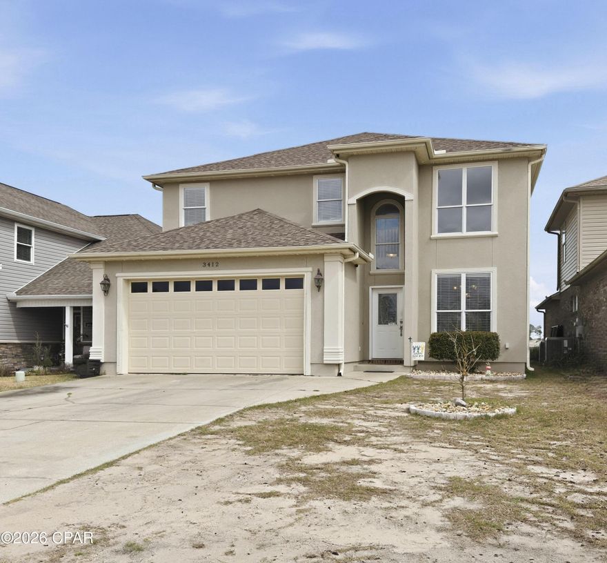 Lake Marin is a deep spring fed lake right in the heart of town.   Minutes from schools, shopping and work, this is a very convenient location to live.  The road has very little traffic so peace and quiet while you enjoy the water view is assured.  Fish right in your backyard!  
 The main bedroom suite is groundfloor, and has lake views.   The modern kitchen is open and excellent for entertaining with a kitchen island the size of a dock!  Cabinets galore and a double door pantry too.  The top of the stairs opens up to a large living room that currently holds the pool table and long views across the lake.  A full bath is just off this room and then there is another full suite also.  All 3 of the upstair bedrooms are larger than usual.  The Laundry room downstairs is just off the kitchen and has extra space for a table or other furniture.  The main bathroom suite has an oversized shower and a garden bath tub.   If you have a large family and or a desire to entertain, this house has all the room you will need.  Lot dimensions and room dimensions are estimates from records, please use a survey or Buyer measure as necessary.   The HOA provides irrigation and lawn service.   Water heater is new in 2024.