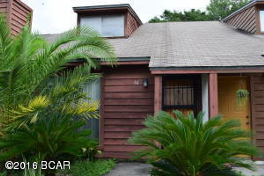 Cute 2bd 2 bath townhome. One bedroom downstairs, master upstairs.  Wood burning fireplace.  Privacy fenced back yard.  Centrally located. Convenient access to the beaches, close to 23rd St.  Small Pet allowed with $400 pet deposit.